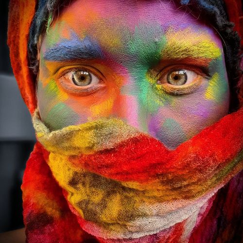 Portrait of a man with multi colored background