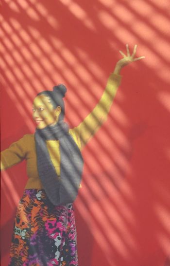 Close-up of person standing against blurred background