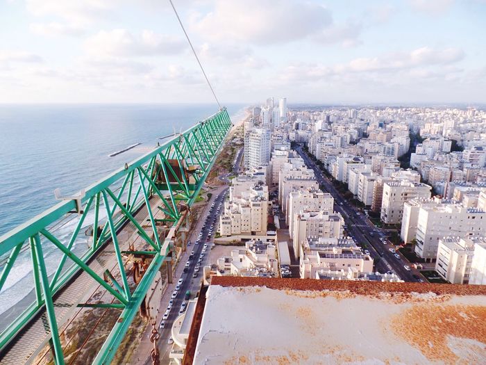 View of sea with buildings in background