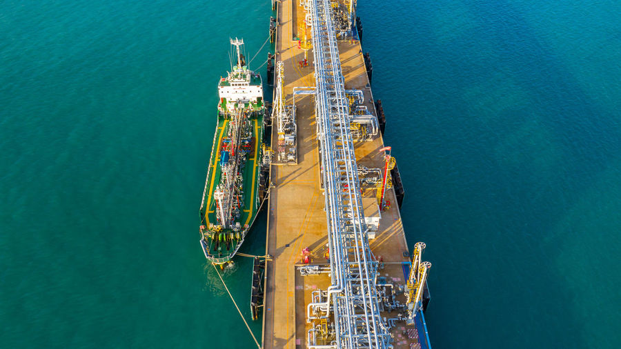 High angle view of commercial dock against sea