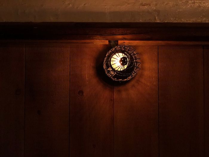 Close-up of clock on wooden door