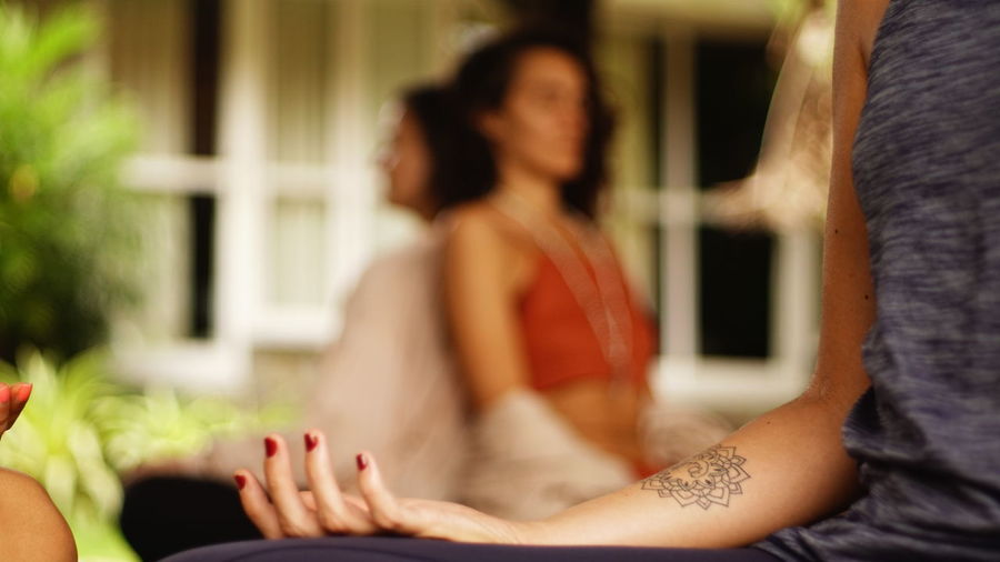 Portrait of young woman meditating