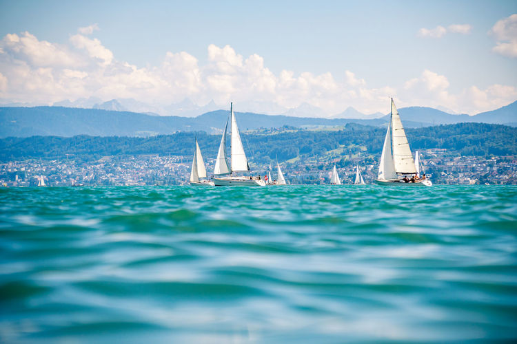 Sailboats on beautiful lake zürich zürichsee in switzerland.