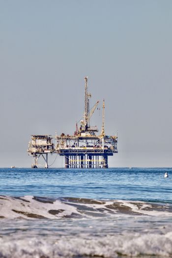 Offshore oil drilling rig off the coast of huntington beach, california, usa