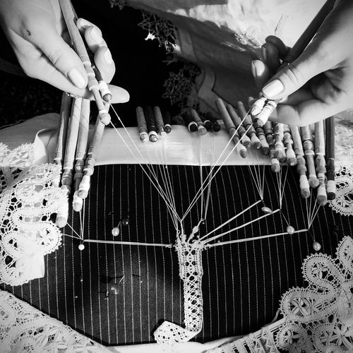 Cropped image of man making machine