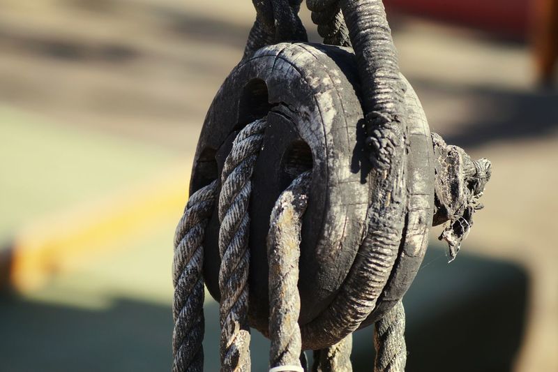 Close-up of pulley with ropes