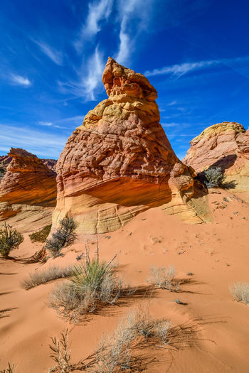 Scenic view of rock formations against sky