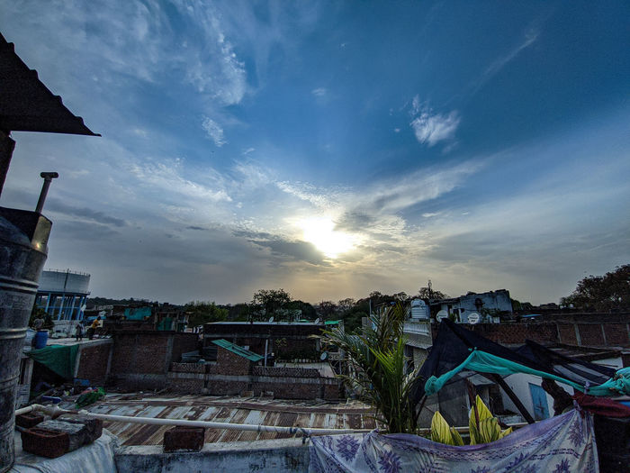 High angle view of buildings against sky during sunset