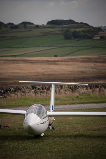 Glider parked at camphill gliding airfield, in the peak district countryside