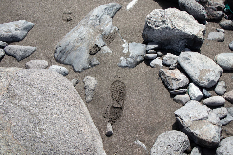 High angle view of stones on beach