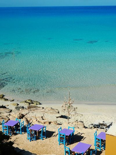 High angle view of beach against blue sky