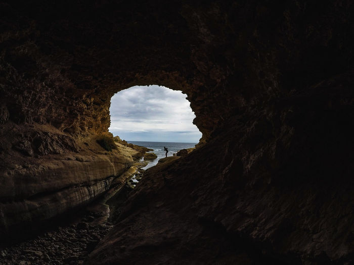 Inside cave looking out to sea and sky