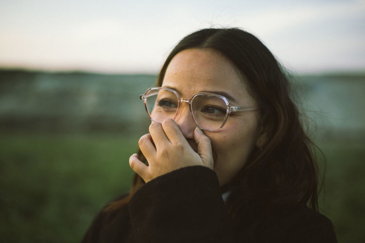 portrait of young woman wearing sunglasses