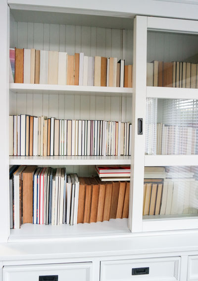 Row of books on shelf at home