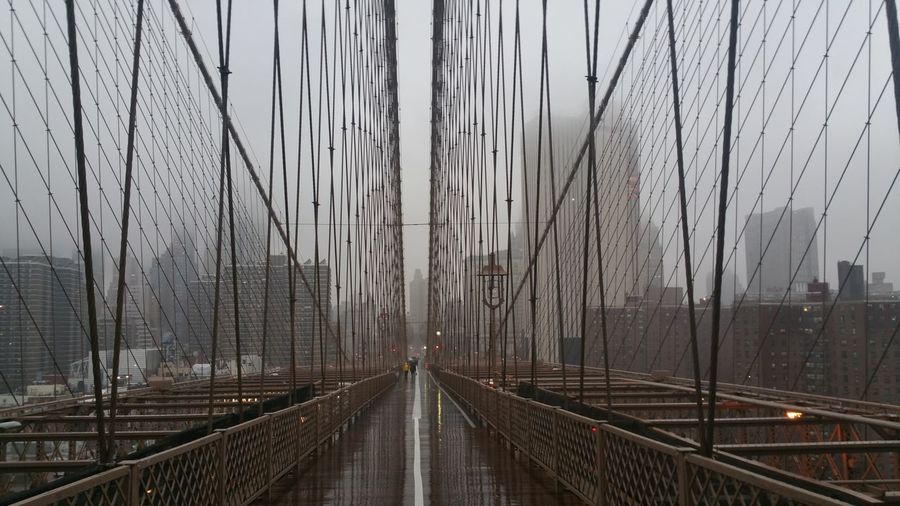 View of suspension bridge in foggy weather