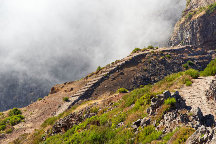 View of hiking path on mountain range of pico do arieiro