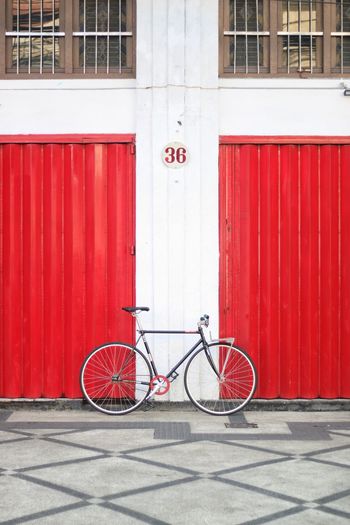 Bicycle parked on street.