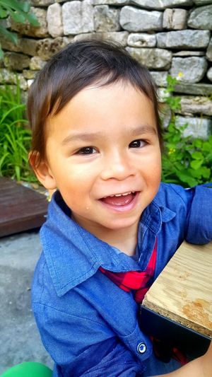 Portrait of cute boy smiling