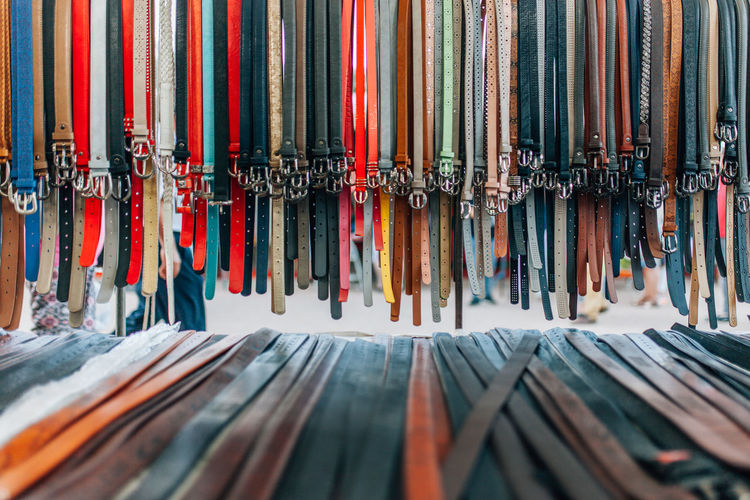 Multi colored belts at market for sale
