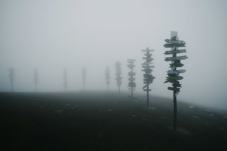 Signs on the mountain in the fog