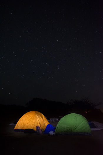 Tent against sky at night