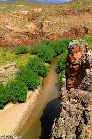 High angle view of river amidst rocks
