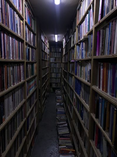 Books on shelves in library