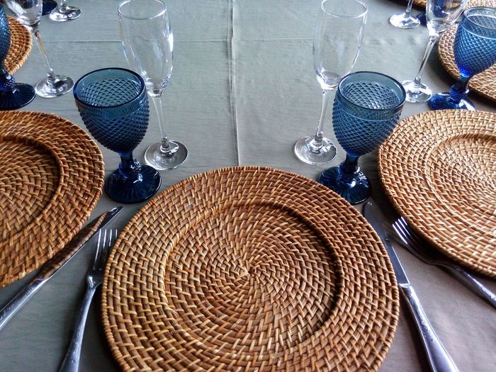 High angle view of wicker plates on table
