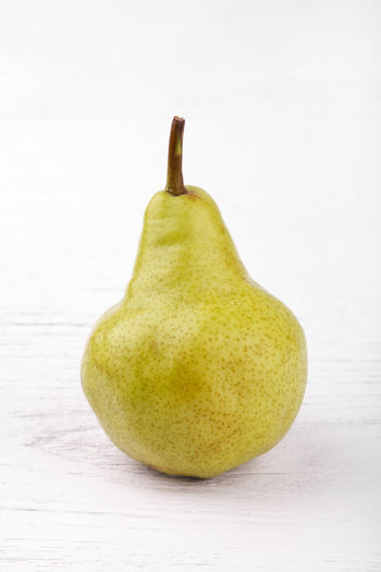 Close-up of apple against white background