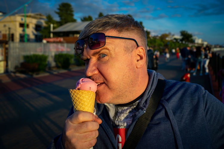 Portrait of young woman ice cream cone