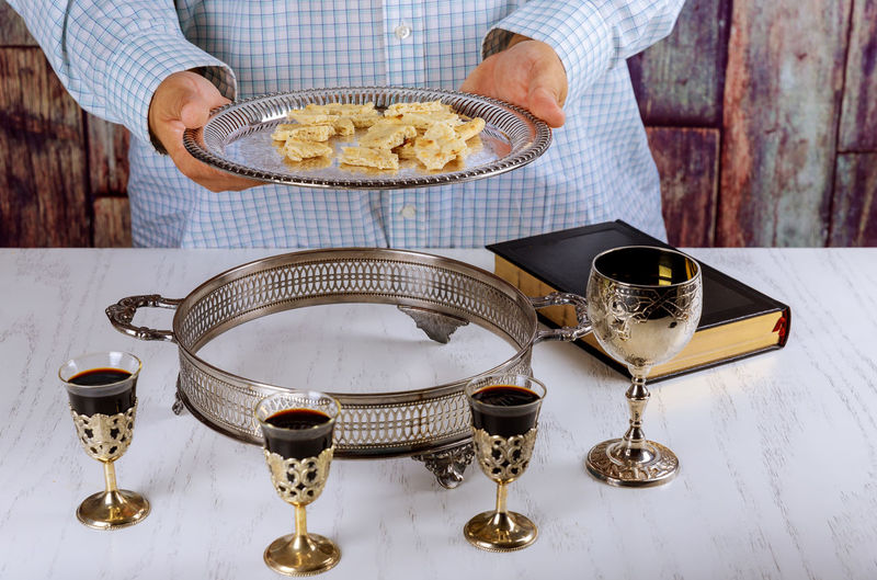 Midsection of man preparing food on table