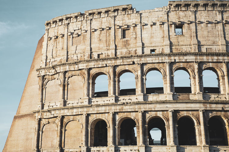 Detail of the ancient colosseum of rome located in the city center, travel reports