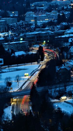 High angle view of illuminated street during winter