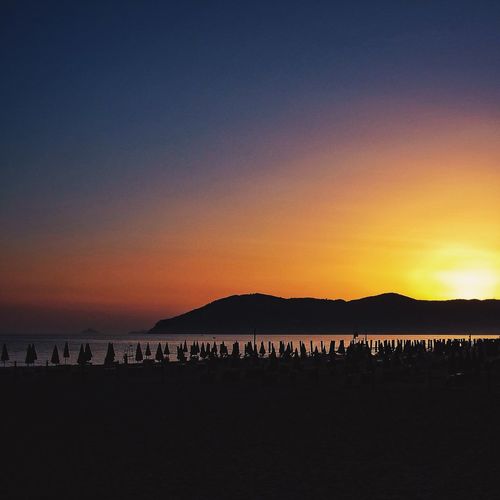 Scenic view of mountains at sunset