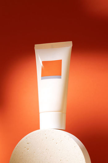 Close-up of dental equipment against yellow background