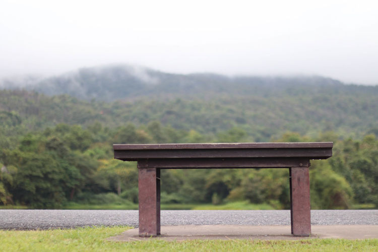 Wooden bench in park