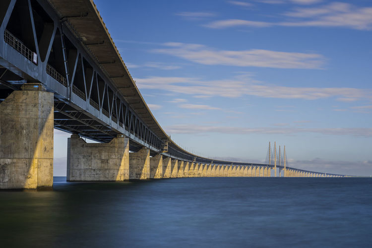 Denmark, copenhagen, oresund bridge stretching over oresund strait