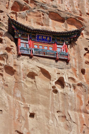 0947 polychrome wooden roof-chapel in qianfo thousand buddha grottoes-mati si temple. zhangye-china.