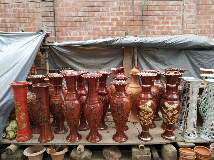 Designed pots for sale at market stall