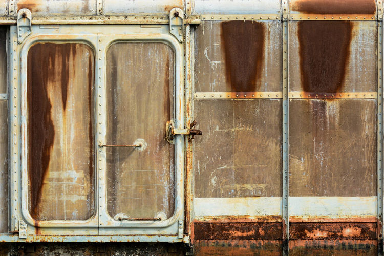 Full frame shot of old rusty metal door