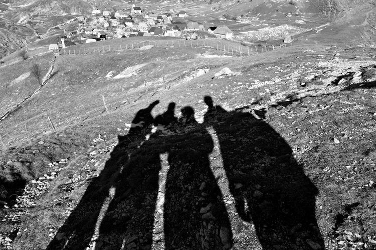 High angle view of people on shadow