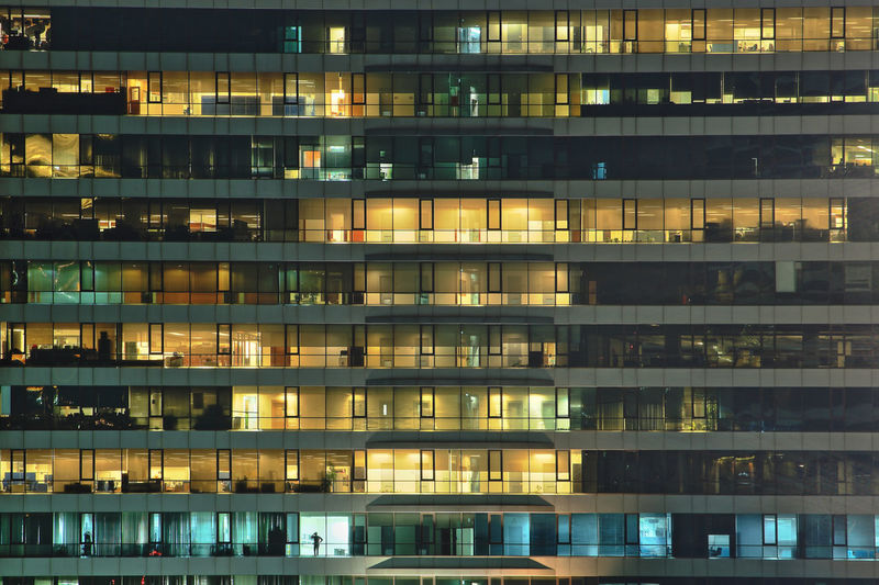 Full frame shot of modern building at night