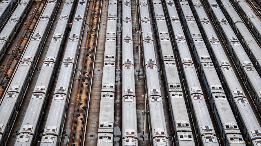 High angle close-up aerial view of hudson yards train depot with train lines, new york, usa