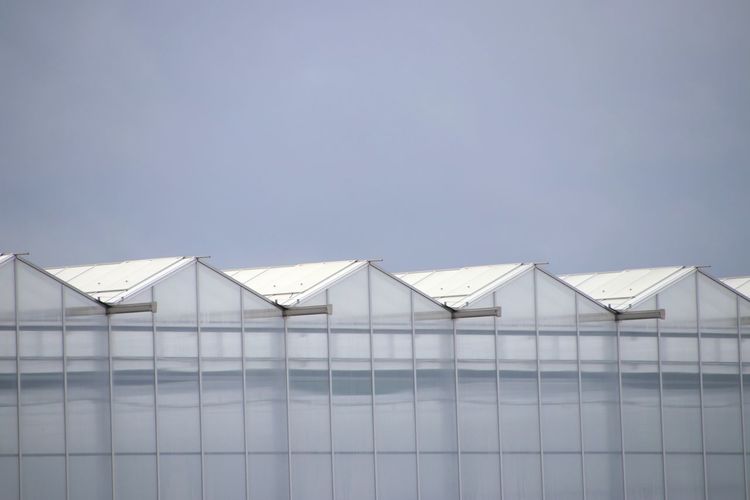 Greenhouse against clear sky