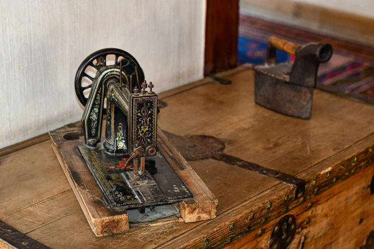 High angle view of old machinery on table