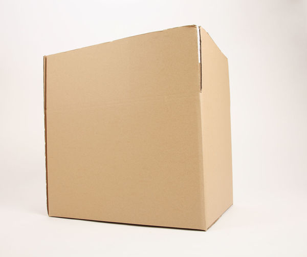 Close-up of box over white background