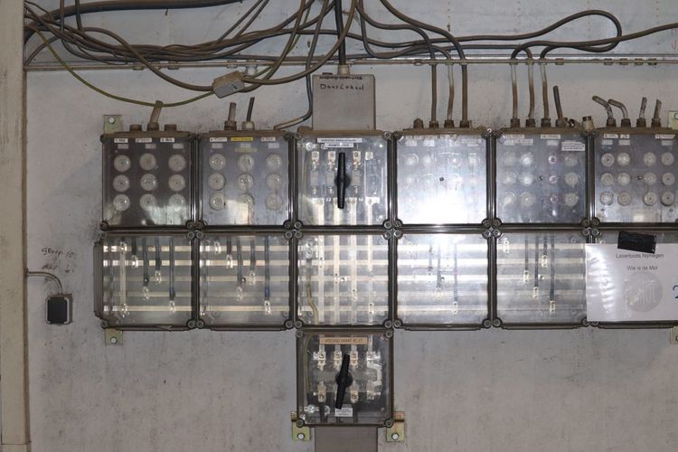 Full frame shot of illuminated lighting equipment hanging on wall