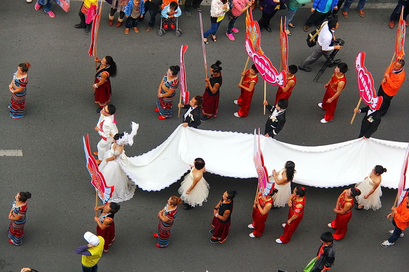 High angle view of chinese new year parade on street in city
