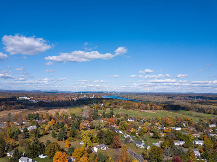 Six flags new england and springfield massachusetts skylines in the distance on an autumn day.