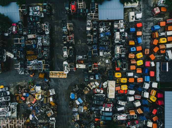 High angle view of abandoned vehicles in city